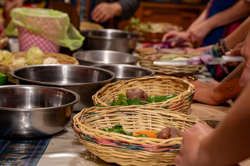 Fresh ingredients in woven baskets ready for the cooking class